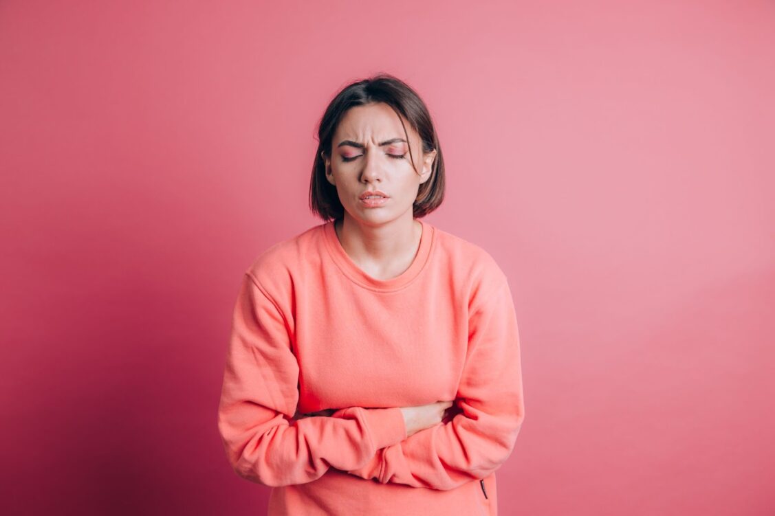 Woman suffering stomach ache