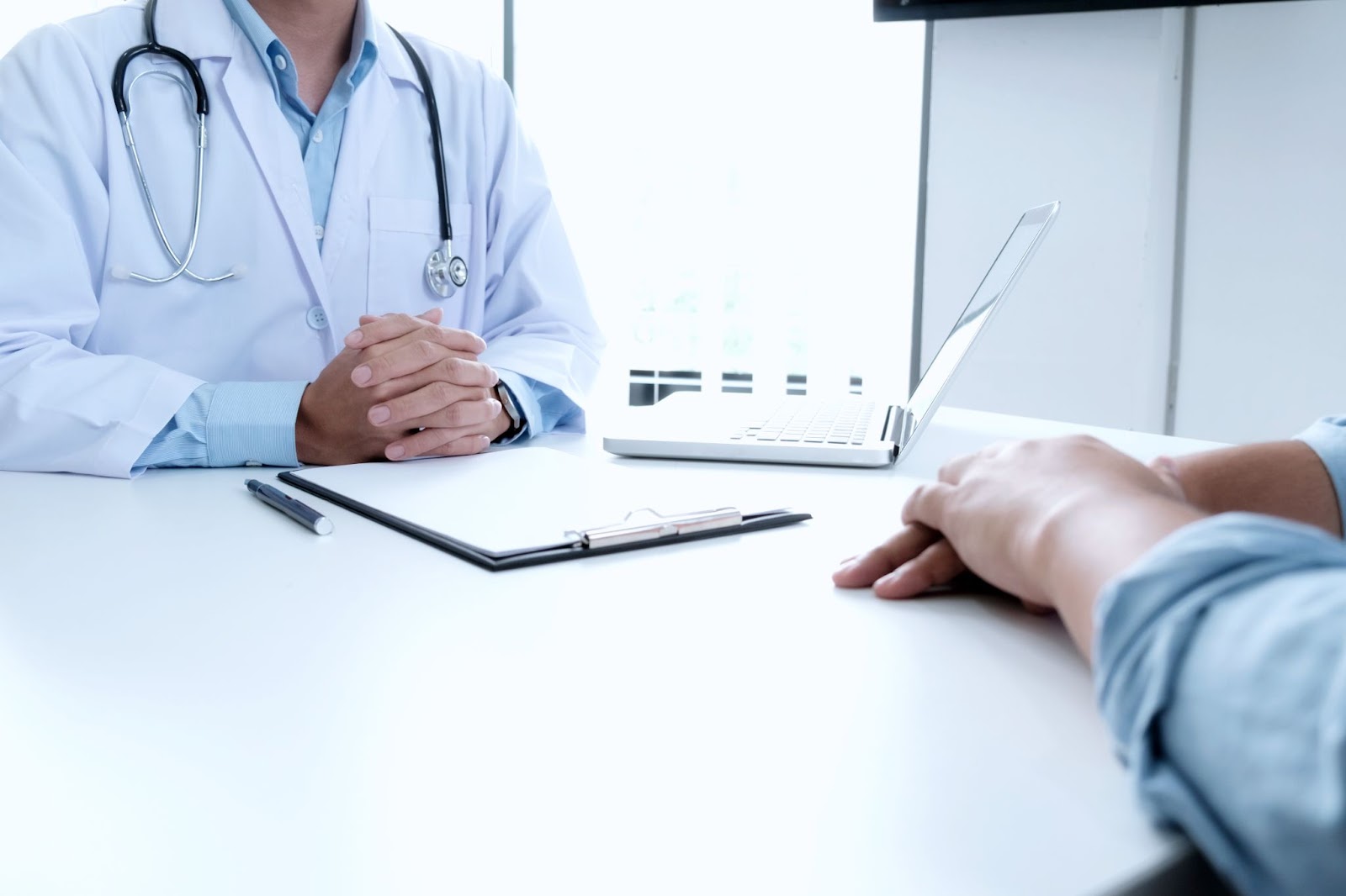 Close up of doctor speaking with patient