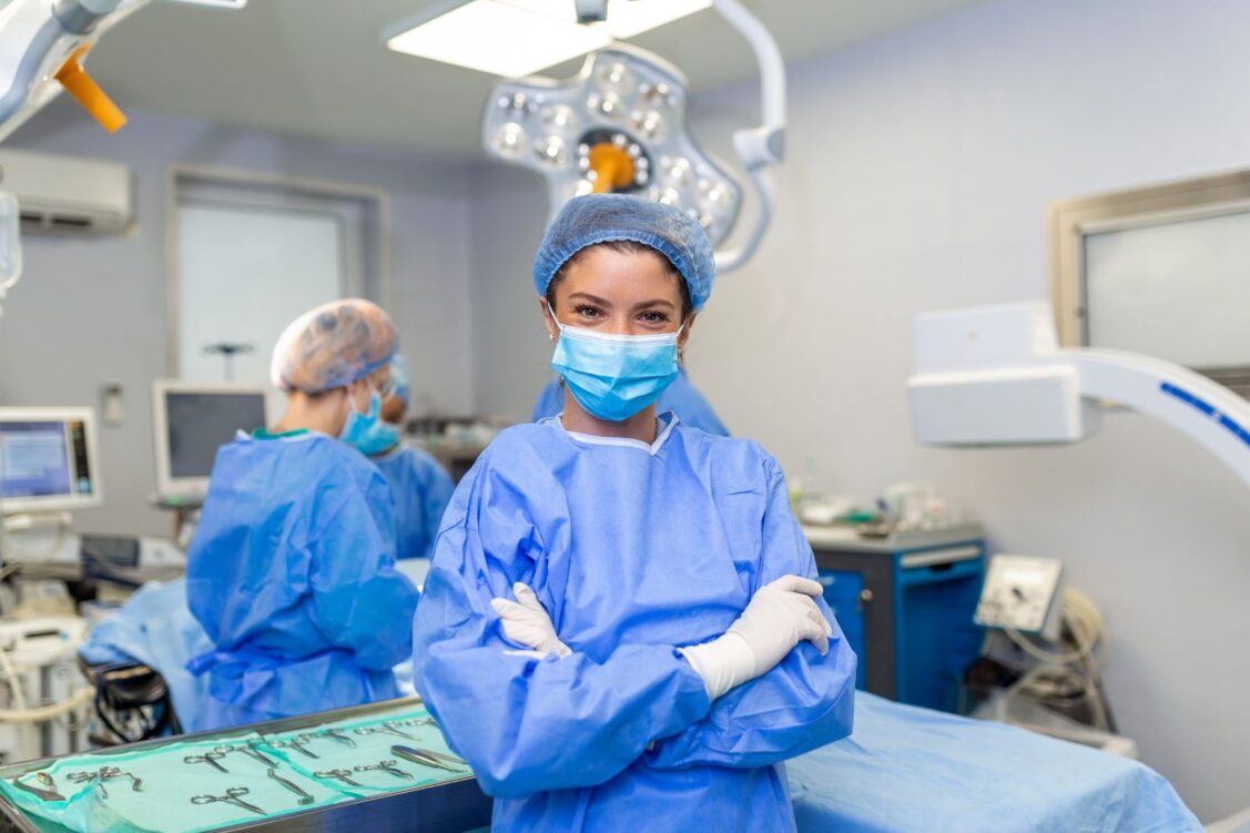 Female doctor standing in operating room