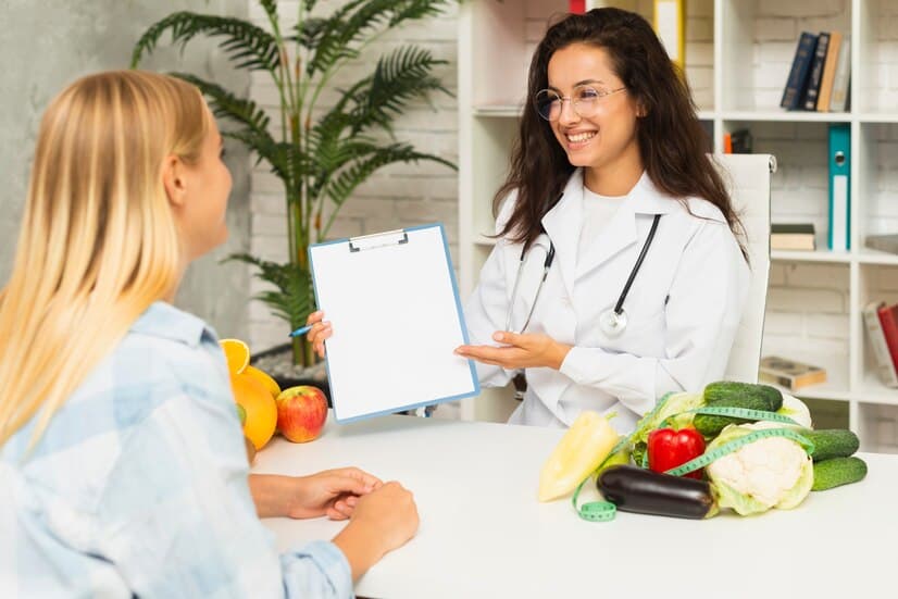 Doctor Showing Results to Patient